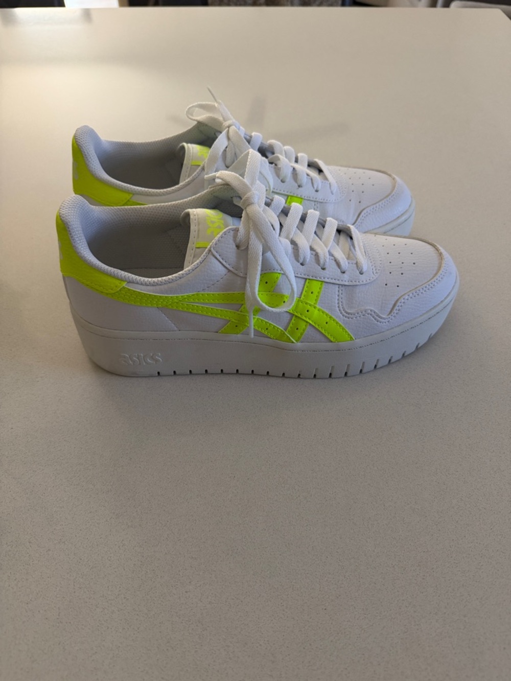 Asics White chunky Sneakers with Neon Yellow Accents.Used only one time.